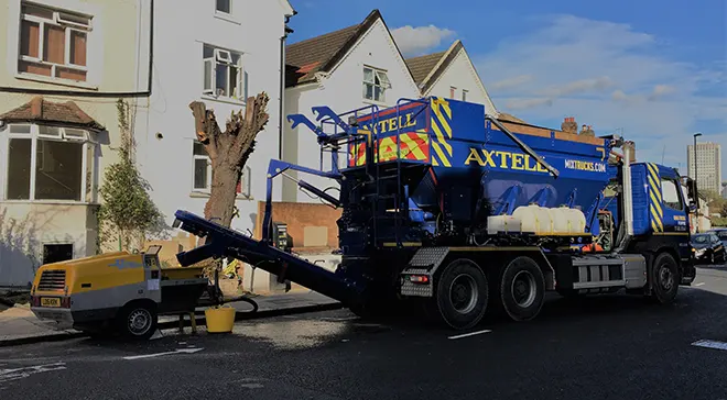 Axtell concrete floor screed delivery truck and screed mixer