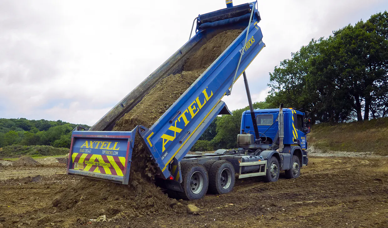 Axtell muckaway services truck tipping soil