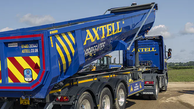 Axtell loose aggregates delivery truck tipping