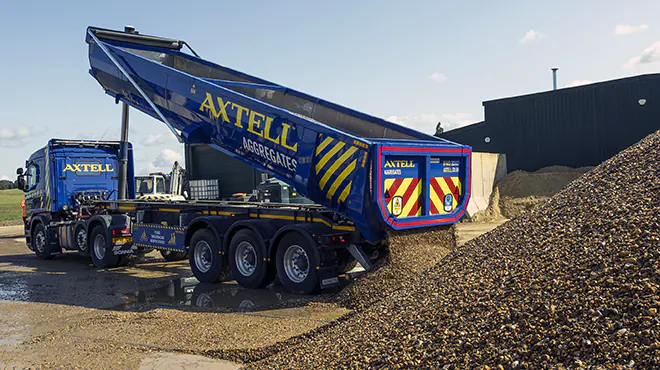 Axtell loose stone aggregate delivery truck tipping product