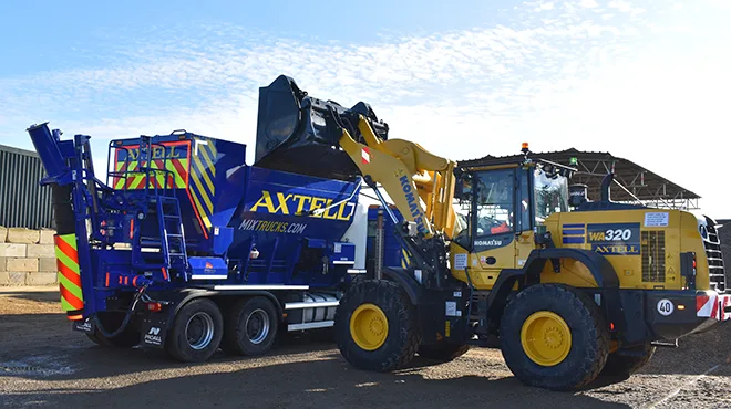 Axtell concrete delivery mix truck being loaded for delivery across the south of England